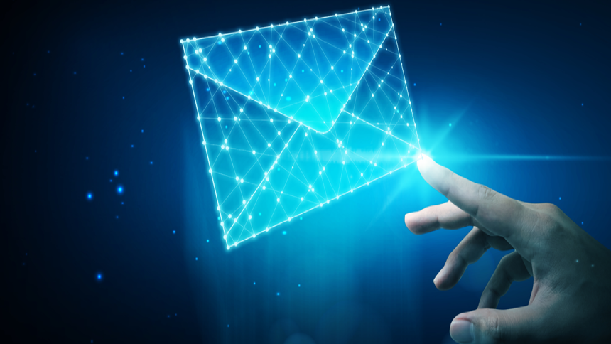 hand touches a shining envelope